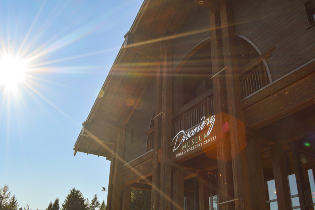 Wooden Discovery Museum with blue sky and sunshine